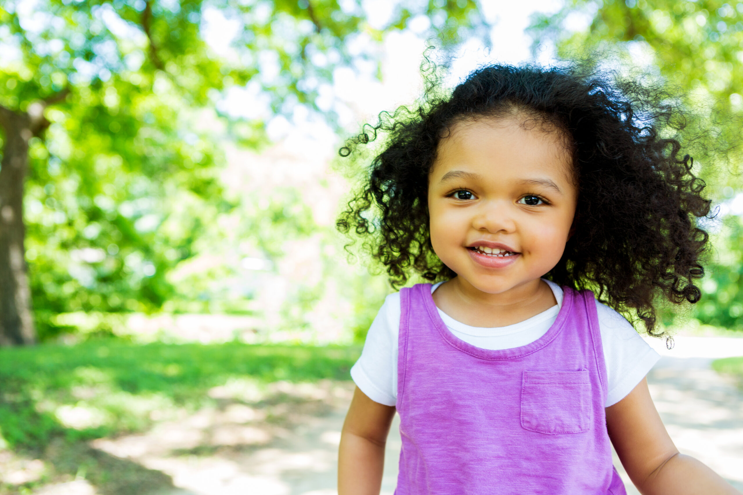 Beautiful little girl in the park